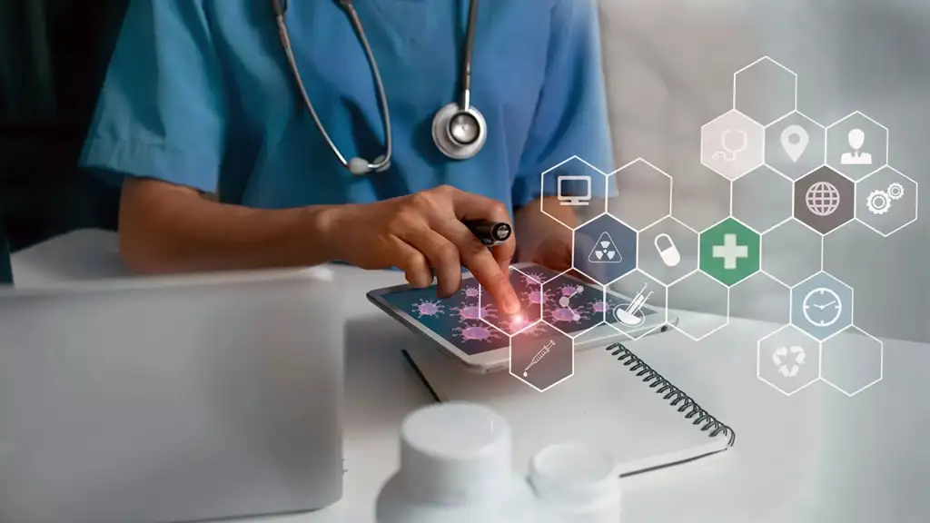 Healthcare professional using digital technology on a tablet for medical analysis and patient care